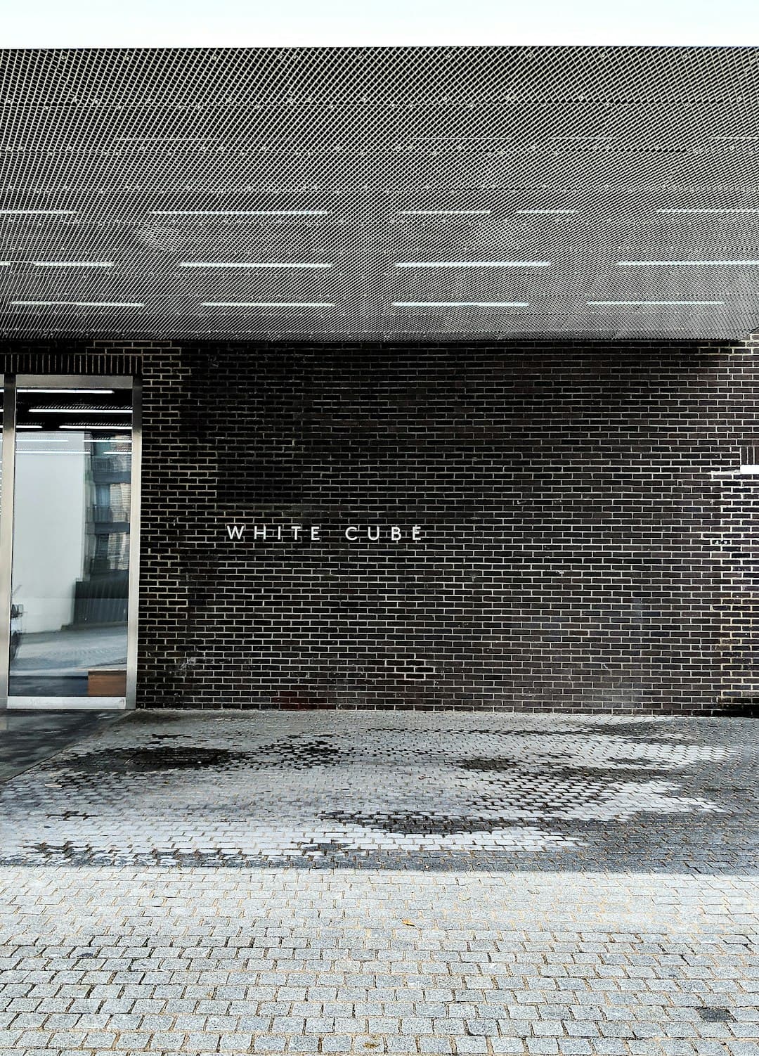 Minimalist white cube representing the platform's clean design approach